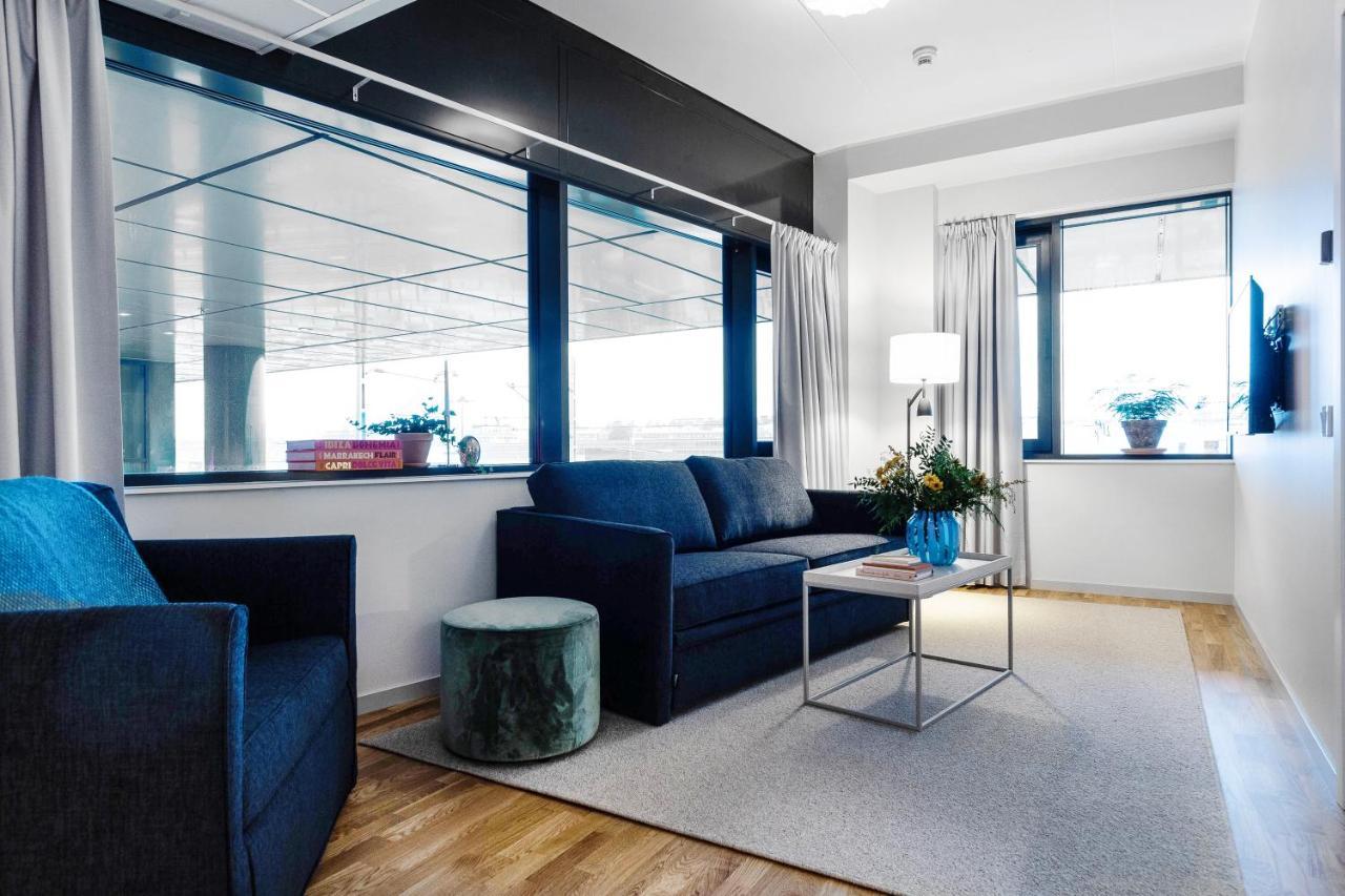 Biz Apartment Bromma Stockholm Ngoại thất bức ảnh A living room in a serviced apartment